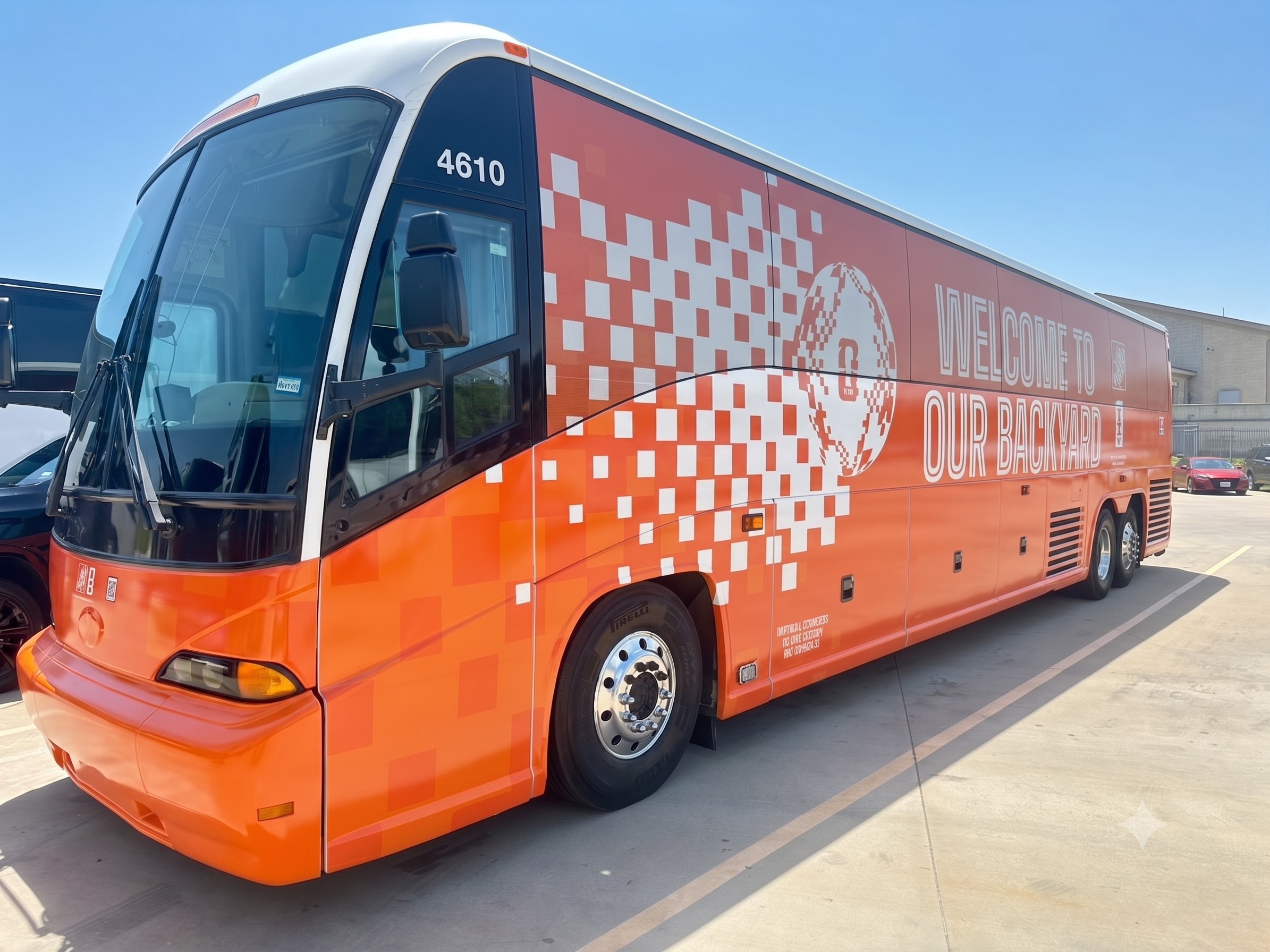 Imperial Charters bus wrapped for FIFA World Cup 2026 - Welcome to Our Backyard