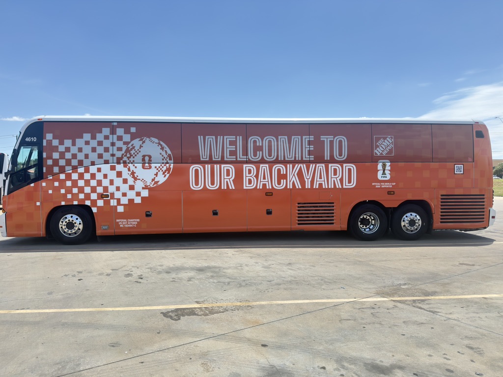 Imperial Charters bus wrapped for FIFA World Cup 2026 - Welcome to Our Backyard